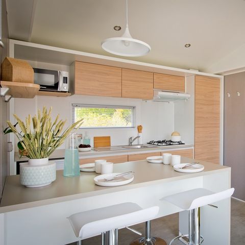 Stacaravan 4 personen - Premium cottage - 2 slaapkamers - 2 badkamers - Bedlinnenpakket, handdoeken, plancha en schoonmaakpakket inbegrepen