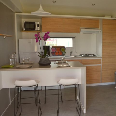Stacaravan 4 personen - Premium cottage - 2 slaapkamers - 2 badkamers - Bedlinnenpakket, handdoeken, plancha en schoonmaakpakket inbegrepen