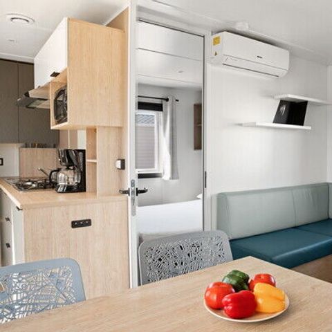 Stacaravan 4 personen - Stacaravan | Comfort XL | 2 slaapkamers | 4 pers | Verhoogd terras | 2 badkamers | Airconditioning | TV