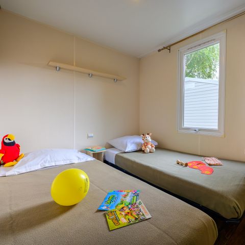 Stacaravan 4 personen - D/ VRIJETIJDSVERBLIJF COMFORT 2 slaapkamers - 25 m² - terras met parasol voor 4 personen