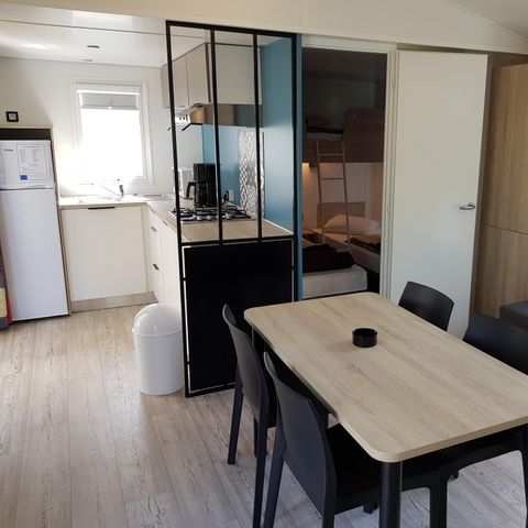Stacaravan 5 personen - Stacaravan Premium 32 m² 2 kamers + terras 12m² halfoverdekt (9m²) + TV + airconditioning 4/5 pers