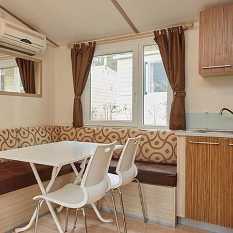 Stacaravan 4 personen - Comfort | 2 Slaapkamers | 4 Pers | Verhoogd terras | Airconditioning | TV