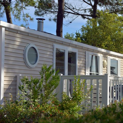 Stacaravan 4 personen - Cottage Confort 2ch. 4 slaapplaatsen -30m2 - Terras met parasol - DIM