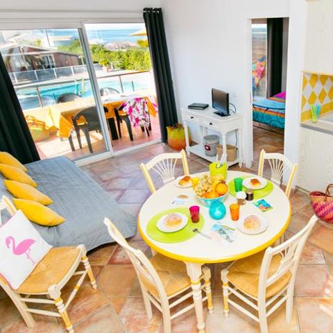 Appartement 4 personen - 3-kamer appartement met mezzanine 45m² - 2 slaapkamers - Airconditioning en TV - Zee- en zwembadzicht