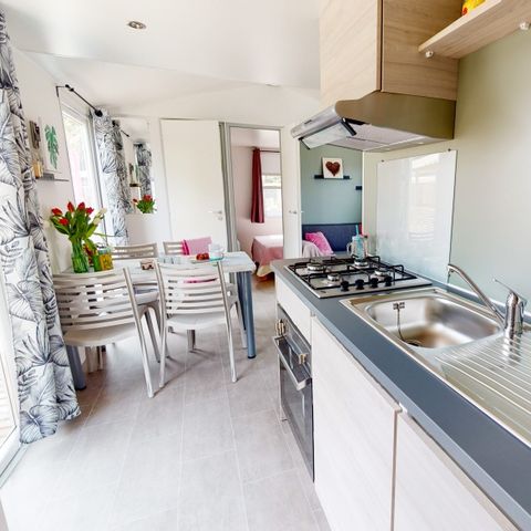 Stacaravan 5 personen - Home Flower Premium 26,5m² (2 kamers, max 4 volwassenen + 1 klein kind) 16m² overdekt terras