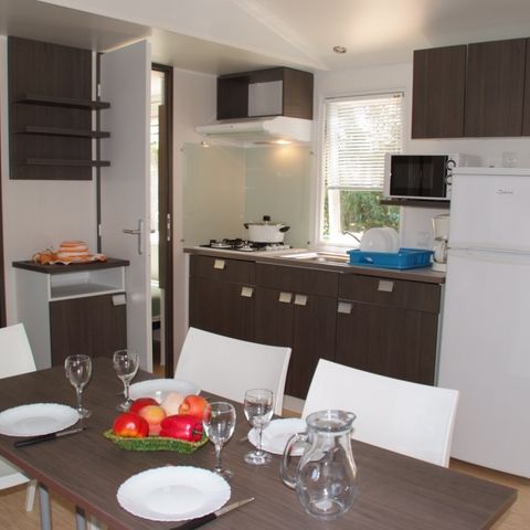Stacaravan 4 personen - Comfort Stacaravan 27m² 2 kamers + overdekt terras - zonder tv - zonder airco 4 pers