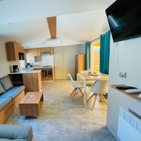 Stacaravan 8 personen - Premium 30-40m² - 3 kamers + TV + Overdekt terras & Bedlinnenpakket aanwezig