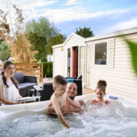 Bungalow 2 personen - 14-Bungalow du Gorguet 40m2 (2ch -2/6pers.) + Jaccuzzi + Opgemaakte bedden + handdoek + drankkit + TV - prijs voor 2 personen