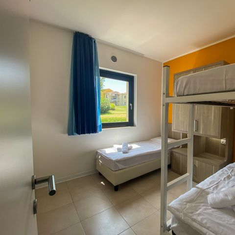 Appartement 6 personen - PREMIUM (begane grond met klein terras)