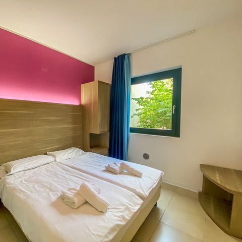 Appartement 6 personen - PREMIUM (begane grond met klein terras)