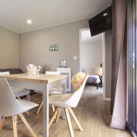 Stacaravan 6 personen - KAMERS SUITES - TV