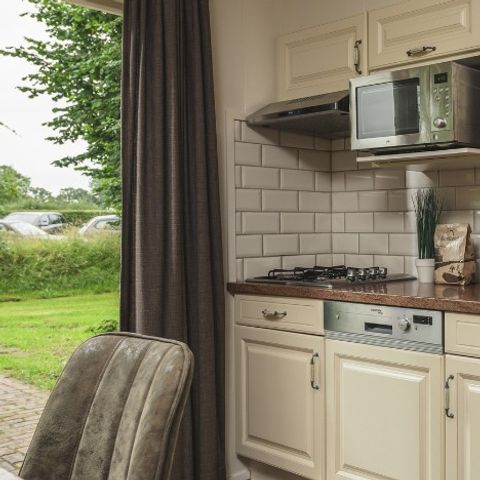 Bungalow 5 personen - Reggehooiberg met sauna en hottub