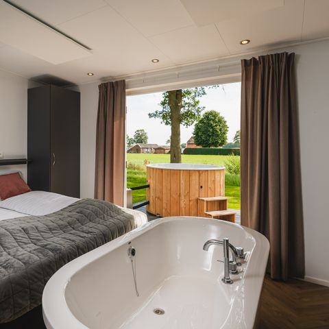 Lodge 2 personen - Panorama Wellnesslodge | hottub, sauna en ligbad