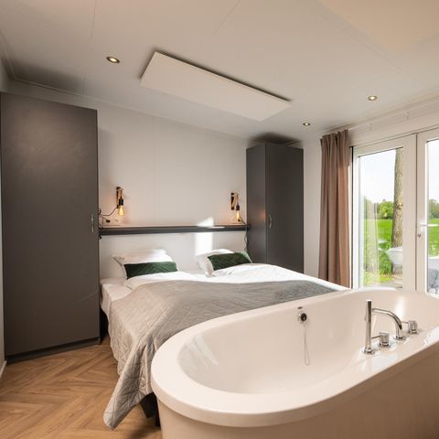 Lodge 2 personen - Panorama Wellnesslodge | jacuzzi, sauna en ligbad