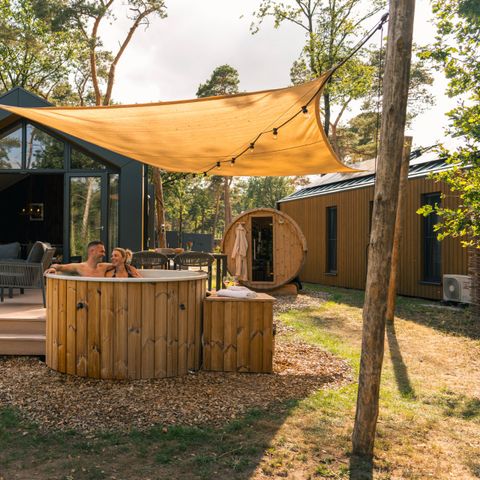 Lodge 6 personen - Boslodge met hottub & sauna