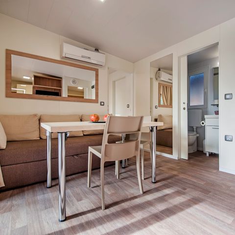 Stacaravan 4 personen - Stacaravan | Comfort XL | 2 slaapkamers | 4 pers | Verhoogd terras | 2 badkamers | Airconditioning | TV